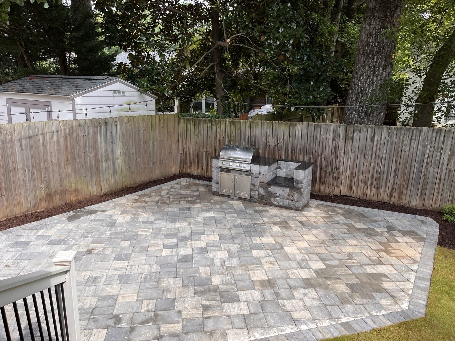 Custom outdoor kitchen and paver patio
